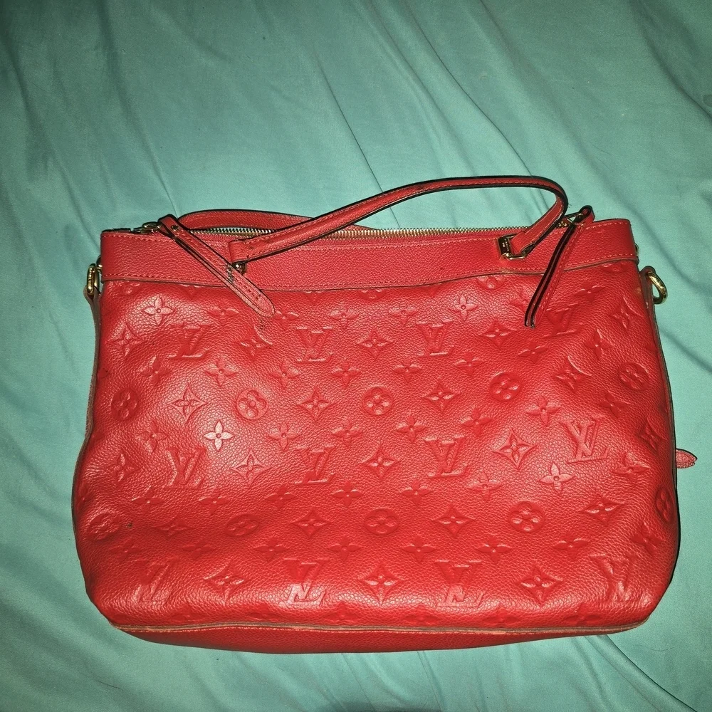 Authentic Louis Vuitton Red Monogram Emperiente Leather Bag